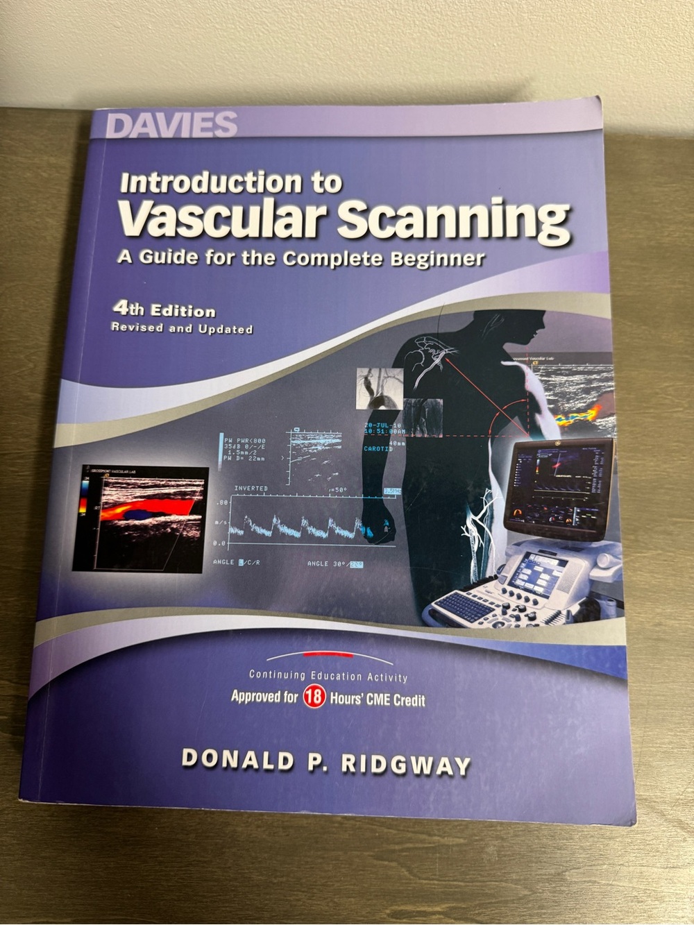 Davines Purple and White "Introduction to Vascular Scanning" Book Cover